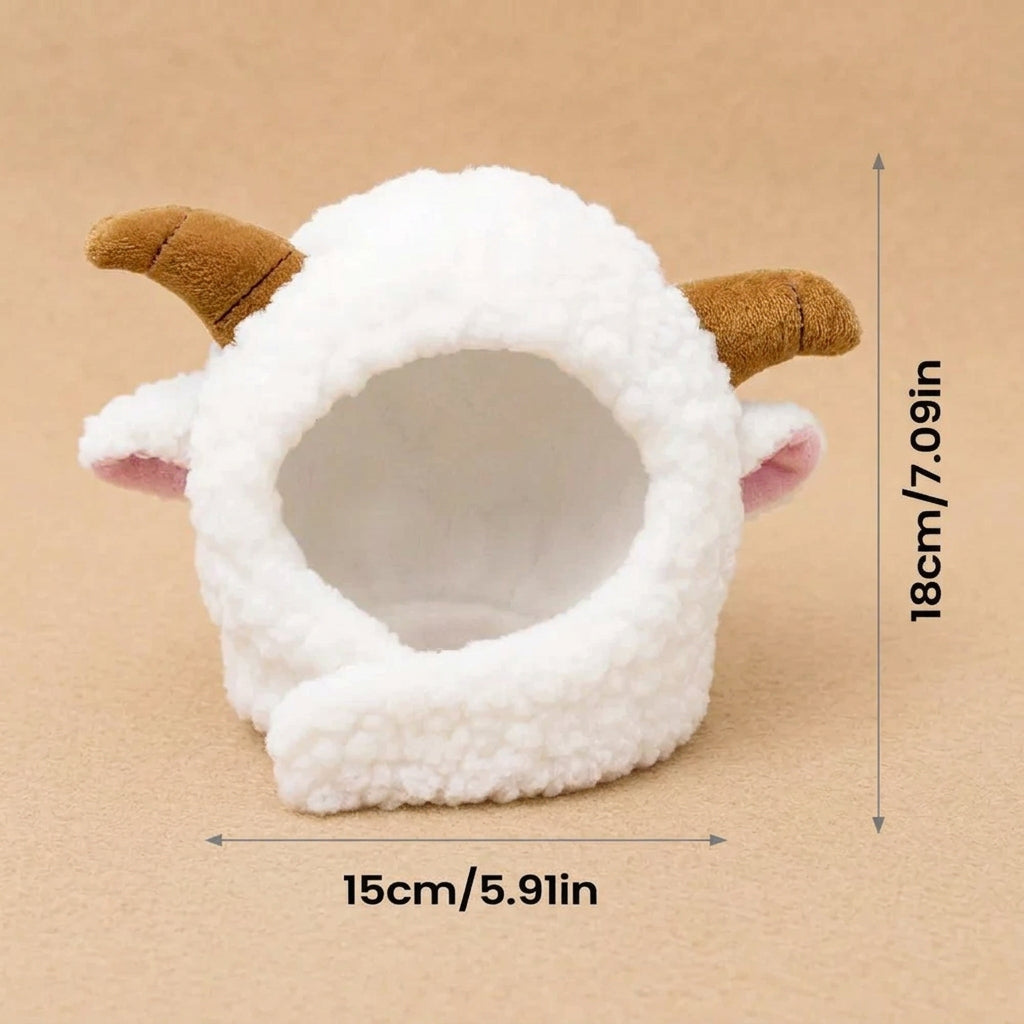 A white plush sheep-shaped pet bed with brown horns and pink inner ears, shown on a white background with dimension lines indicating 15 cm width and 18 cm height.