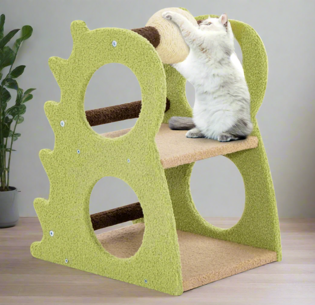 Green cat play structure with a cat climbing on it against a white background
