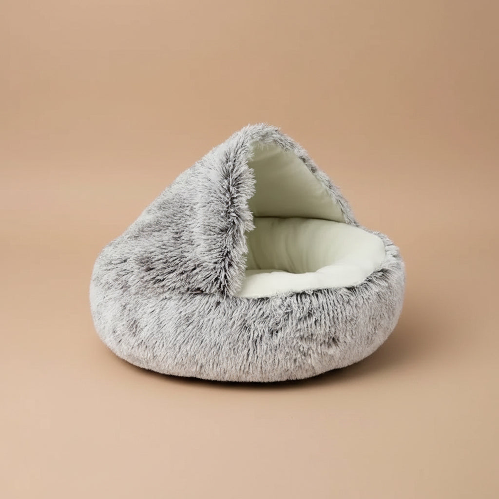 Fluffy pet bed with a brown label indicating color on a beige background