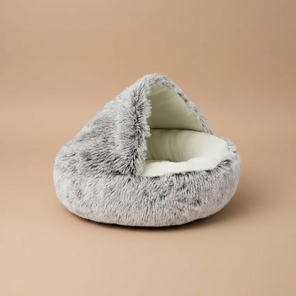 Fluffy pet bed with a brown label indicating color on a beige background
