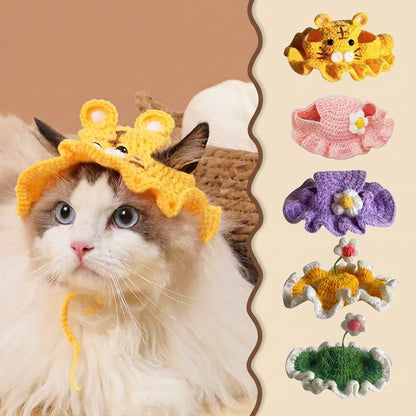 A fluffy white and brown cat wearing a yellow crocheted animal hat, shown beside a vertical panel displaying additional pet hat styles in yellow, pink, purple, and green.