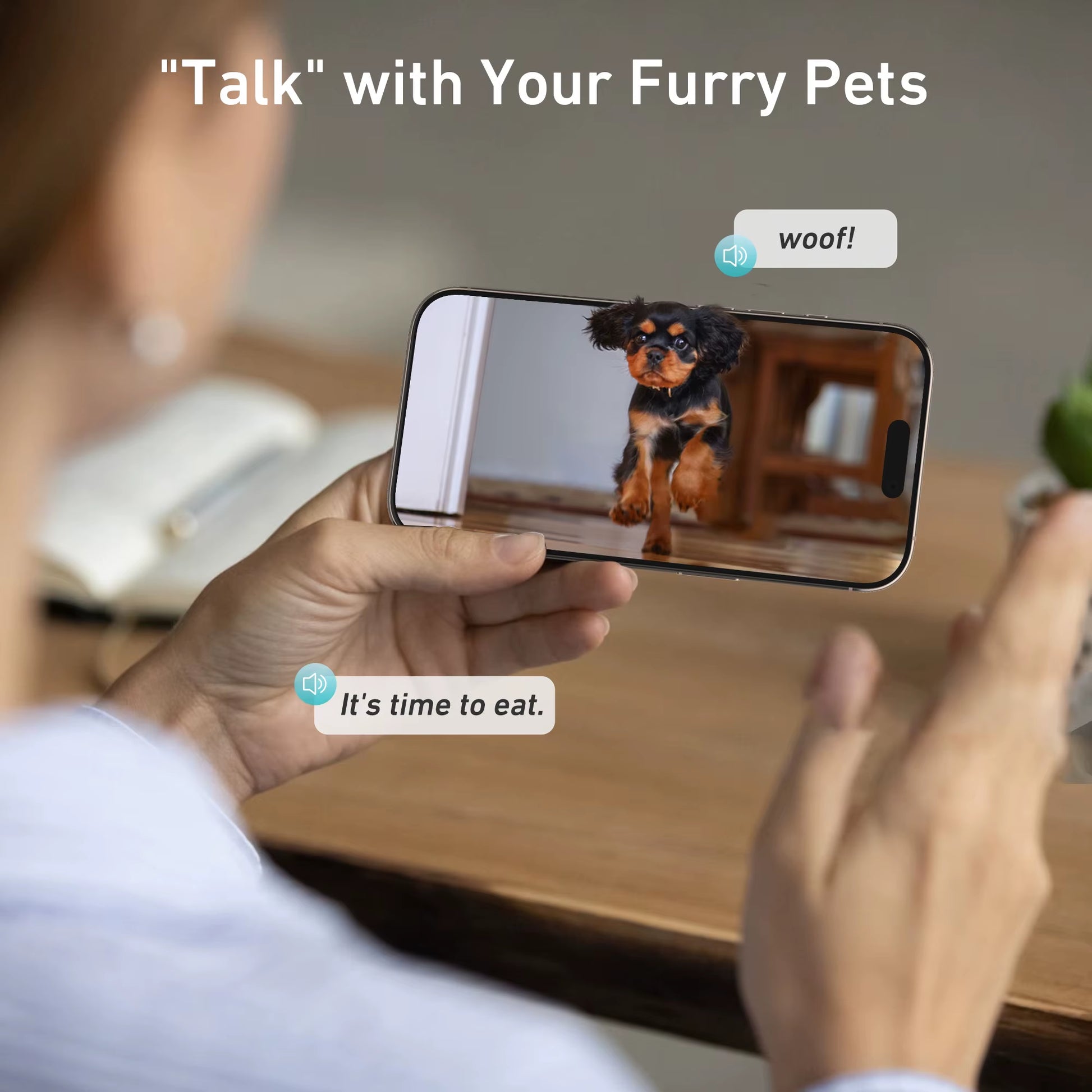 Person using a smartphone with a dog app showing a dog and text messages on the screen.
