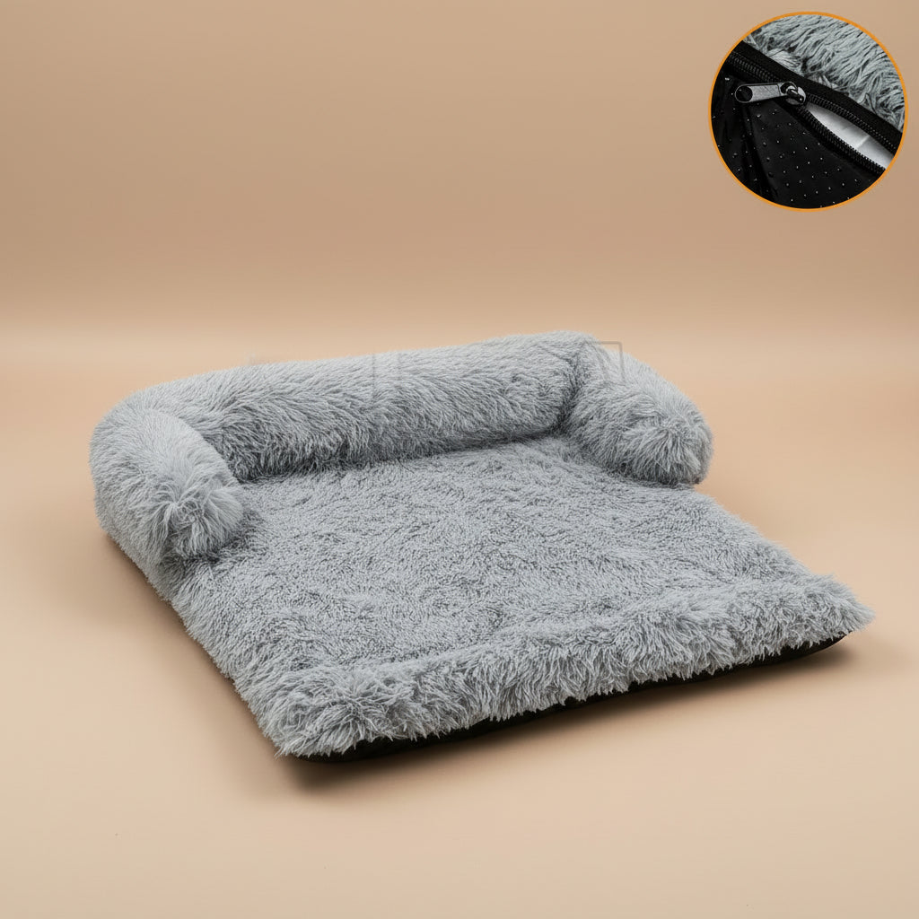 Gray fluffy blanket with a close-up of a zipper on a white background