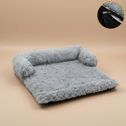 Gray fluffy blanket with a close-up of a zipper on a white background