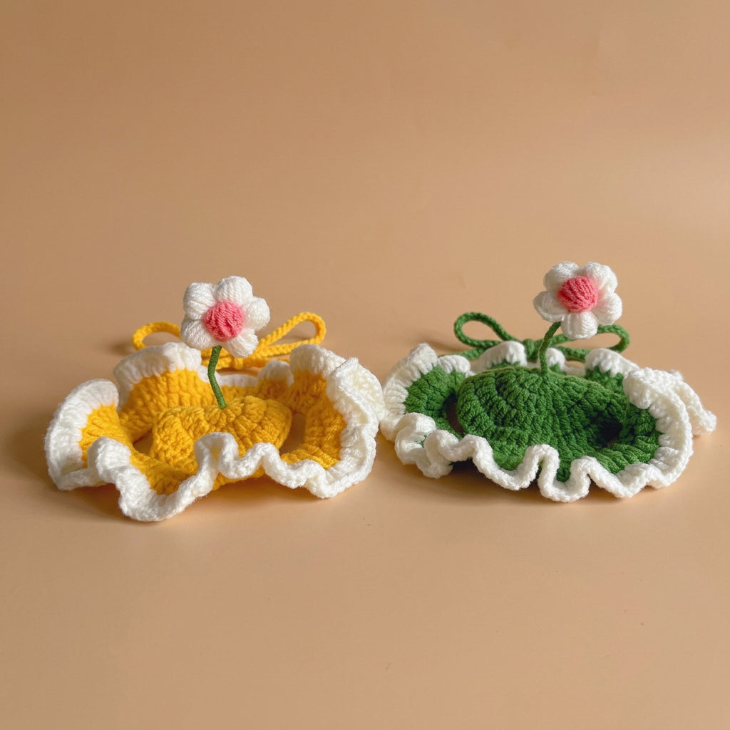 Two crocheted items resembling flowers and leaves on a beige background