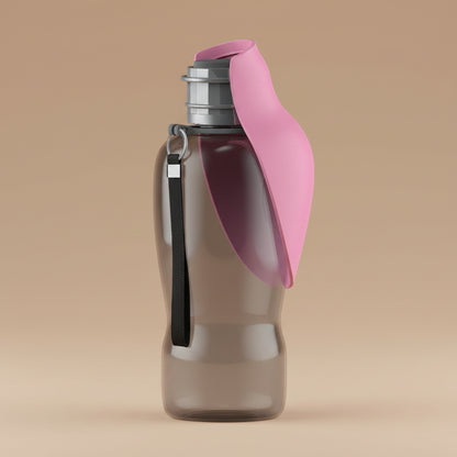 Clear water bottle with pink cap and side panel on a beige background