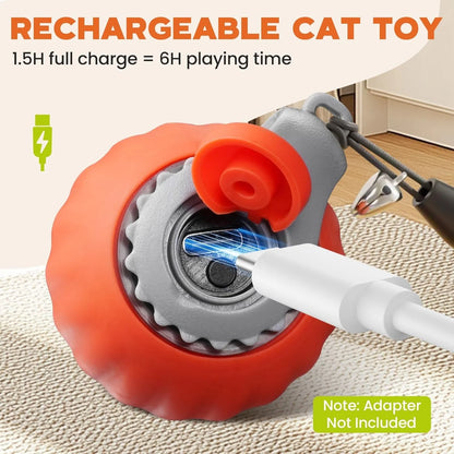 Rechargeable cat toy with charging cable on a textured surface