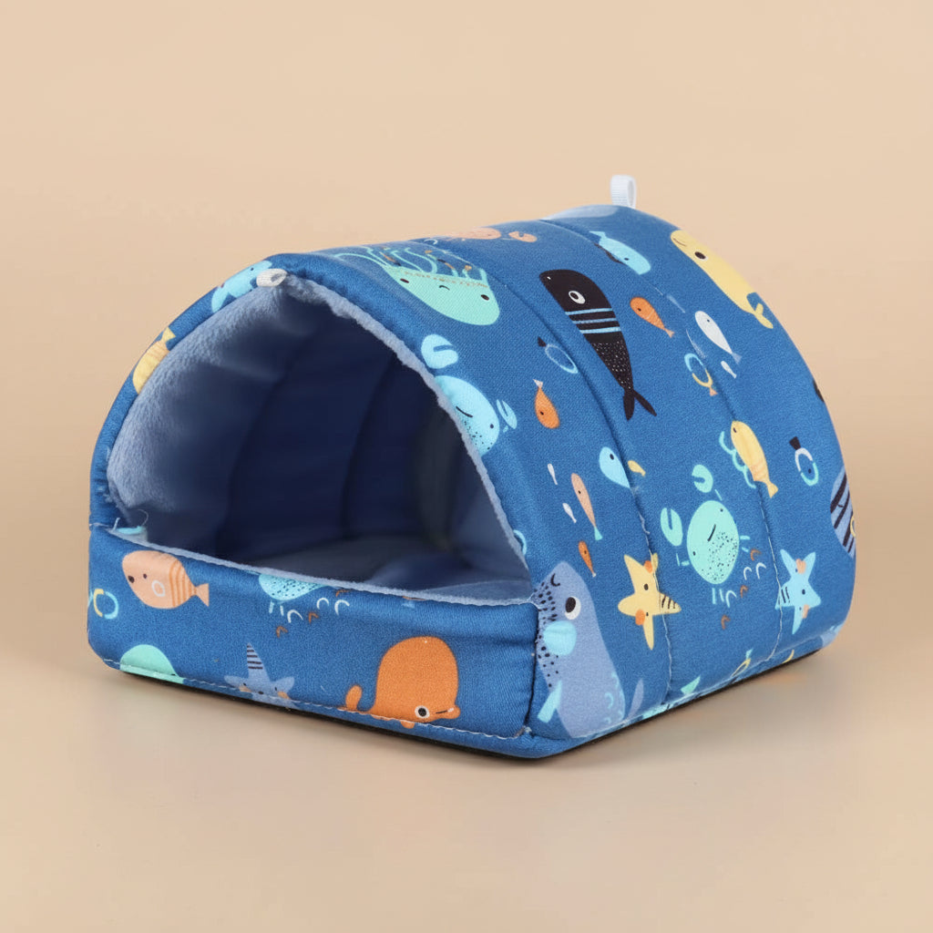 Ocean Blue pet bed with ocean-creature themed  pattern on a beige background
