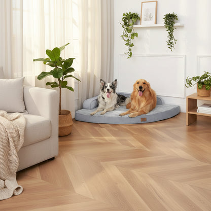 Two dogs on a triangle-shaped dog bed with text promoting its space-saving design.
