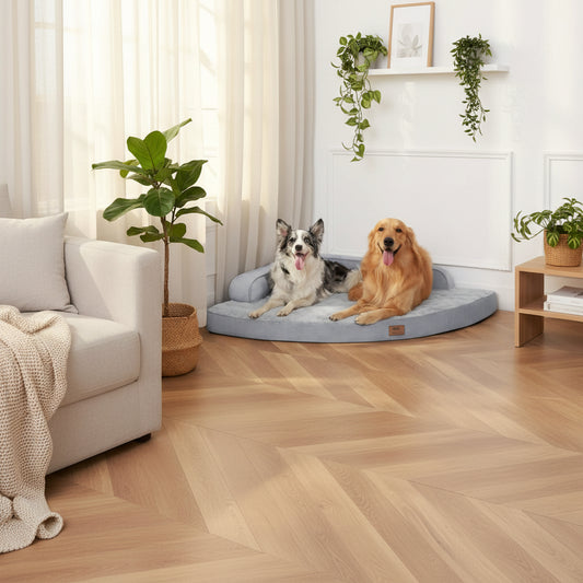 Two dogs on a triangle-shaped dog bed with text promoting its space-saving design.
