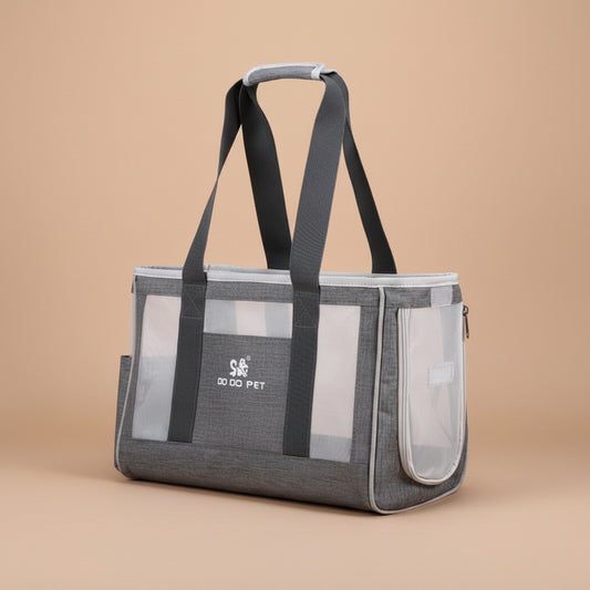 Gray pet carrier with transparent sides on a beige background