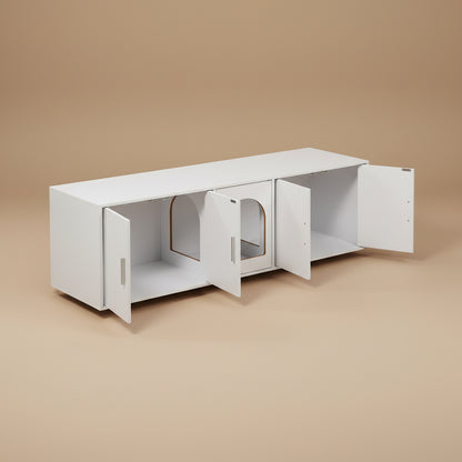 White litter box enclosure cabinet with open doors on a beige background.