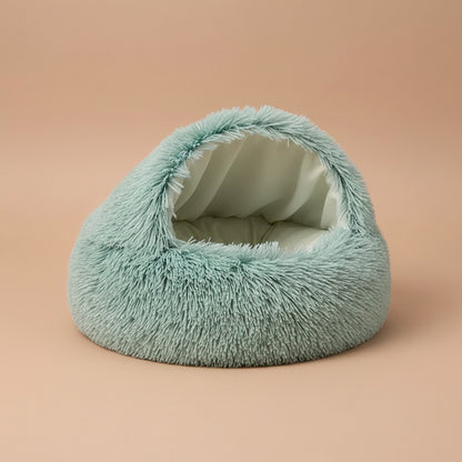 Green fluffy pet bed on a white background