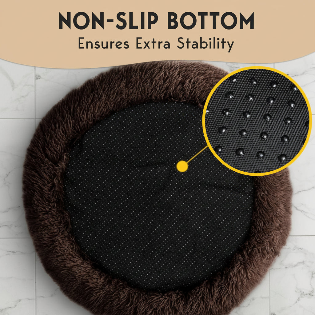 Round black cushion with brown fuzzy rim on a marble surface, highlighting non-slip bottom.