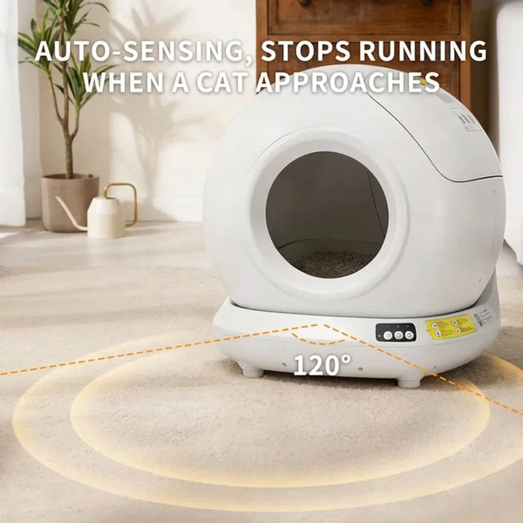 White pet litter box featuring text about auto-sensing and stopping when a cat approaches.