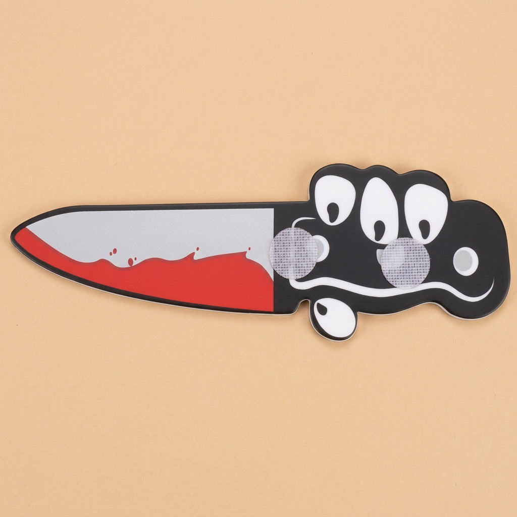 Cartoon knife with velcro on a tan background