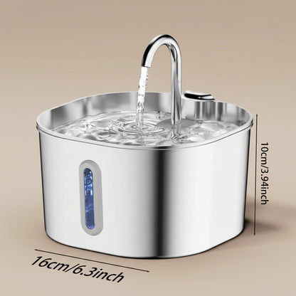Stainless steel pet water fountain with water flowing and product dimensions displayed, shown on a beige background.