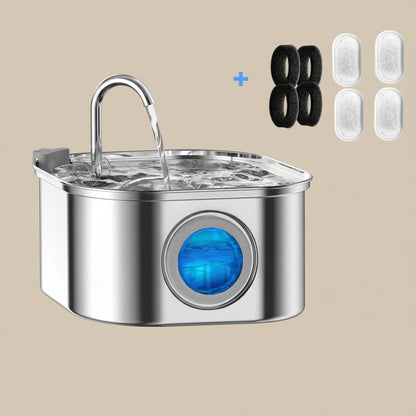 Stainless steel pet water fountain with blue light indicator, additional filters on a beige background.