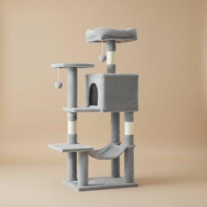Gray cat tree with multiple levels and perches in a living room setting.