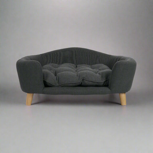 Dark gray sofa with wooden legs on a white background