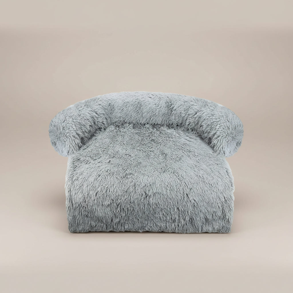 Fluffy gray chair on a white background