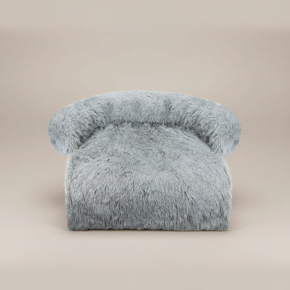 Fluffy gray chair on a white background