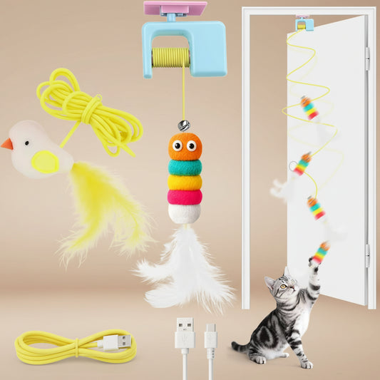 A USB-powered cat toy set featuring a colorful worm-shaped ball with a feather, a yellow rope with a bird toy, and a spiral webbing toy stretched across a door. A gray tabby cat is shown interacting with the spiral toy on a white door, with the USB charging cable shown at the bottom.
