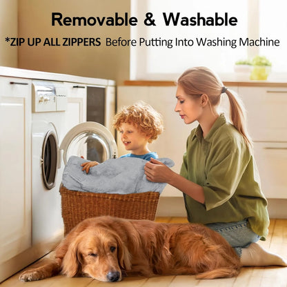 Woman and child with a dog in a laundry room, holding a towel.