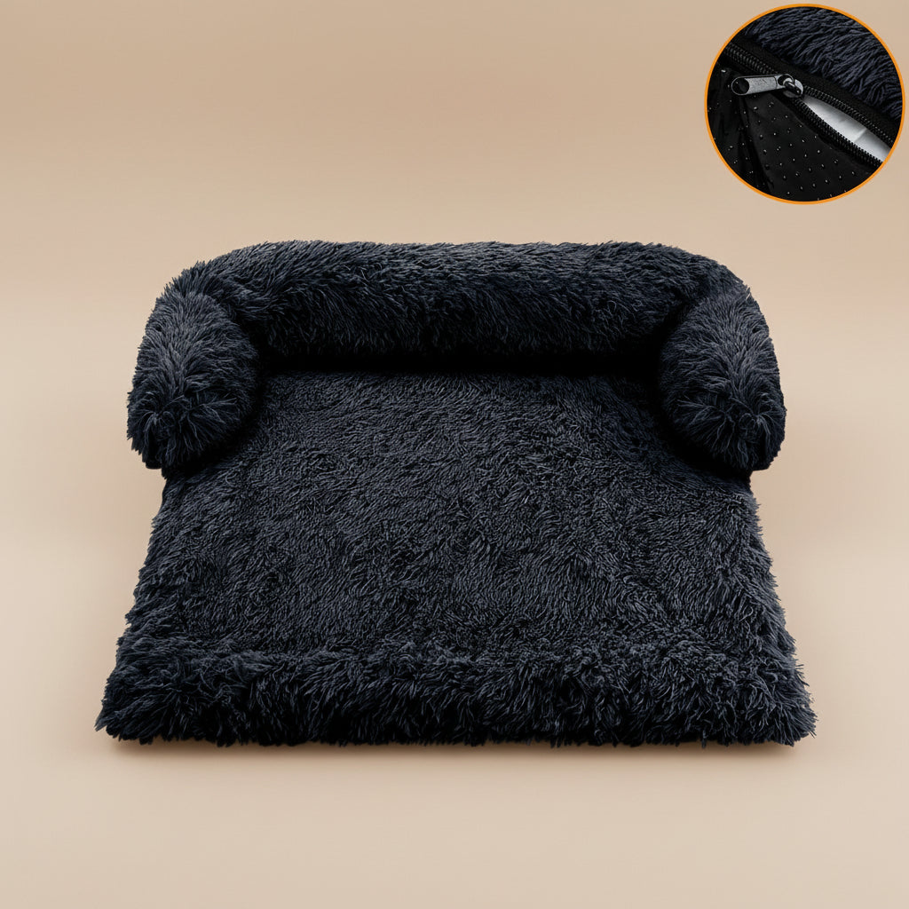 Dark gray fluffy pet bed with a zipper detail on a white background