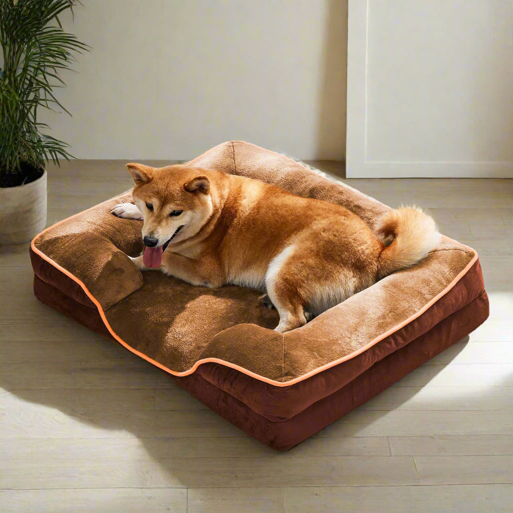 A Dog laying on the  24"X18" Orthopedic Dog Sofa Bed Small with Removable Washable Cover, Brown