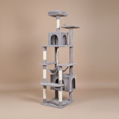 Cat tree with multiple levels, 2 condos, hammock on a beige background