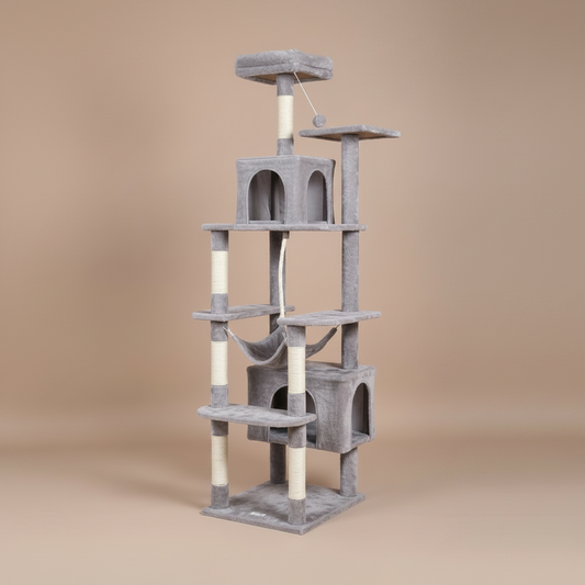 Cat tree with multiple levels, 2 condos, hammock on a beige background