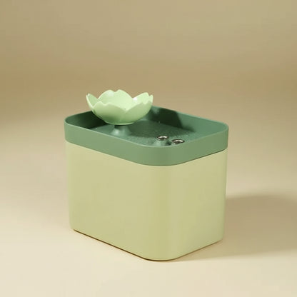 Green lotus design pet water fountain on a beige background