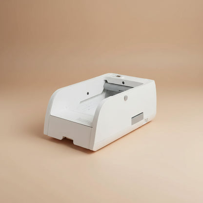 White electronic device on a beige background