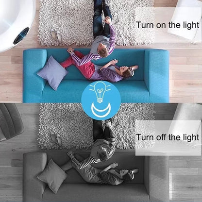 Two people lying on a blue couch with text instructions to turn on and off a light, and a remote control icon.