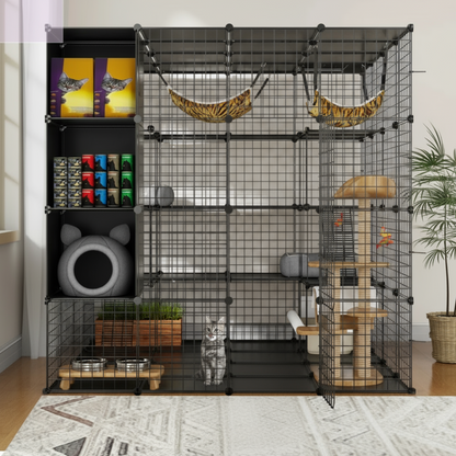Child holding a cat next to a large black pet cage with various accessories in a room.