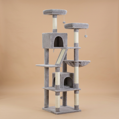 A tall gray cat tree with multiple levels, perch platforms, a climbing ramp, hanging toy balls, and cat cubbies, shown on a white background with three cats sitting on it and two hanging toys above.