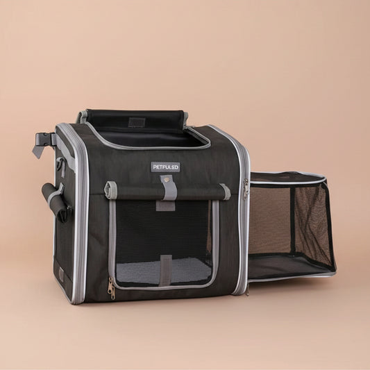 Pet carrier/bike basket with mesh sides on a beige background