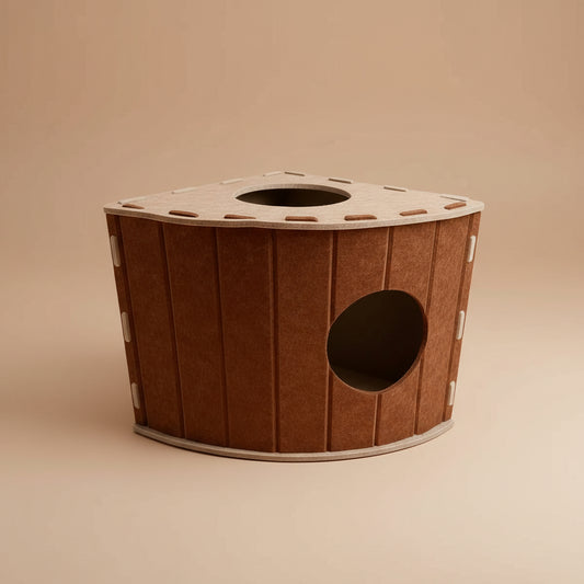 Beige and brown Felt cat house on a beige background