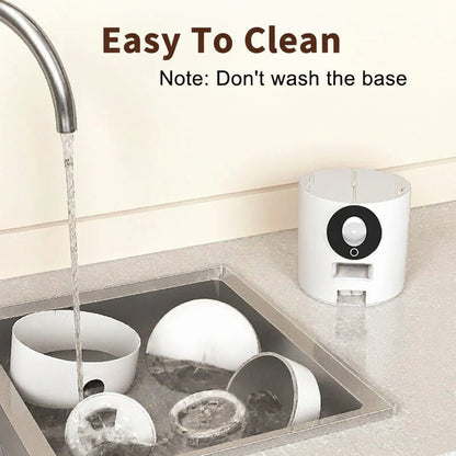 Dishwasher with dishes being washed and a note indicating not to wash the base.