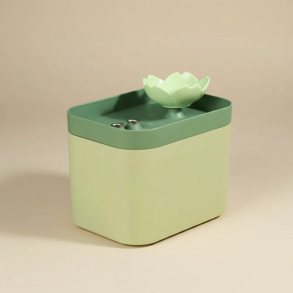 Green and beige pet water fountain with a lotus design on a beige background