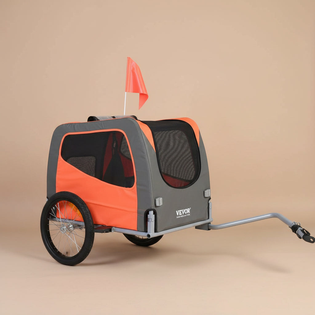 Pet bike trailer with orange and gray design on a beige background