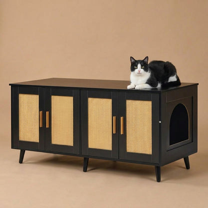 A black cat condo cabinet with woven cane doors, shown on a white background with an black and white cat lying on top.