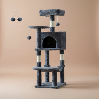 Gray cat tree with multiple levels and hanging toys on a beige background