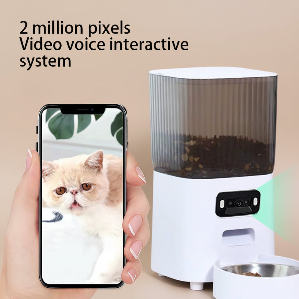 Pet feeder with smartphone displaying a cat's face, labeled '2 million pixels Video voice interactive system'.