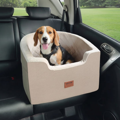 Dog sitting in a beige pet seat in a car with a green field outside.