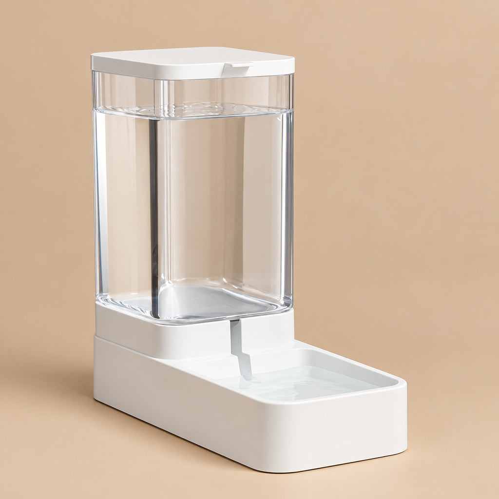 Modern white  and clear gravity fed pet water dispenser on a beige background