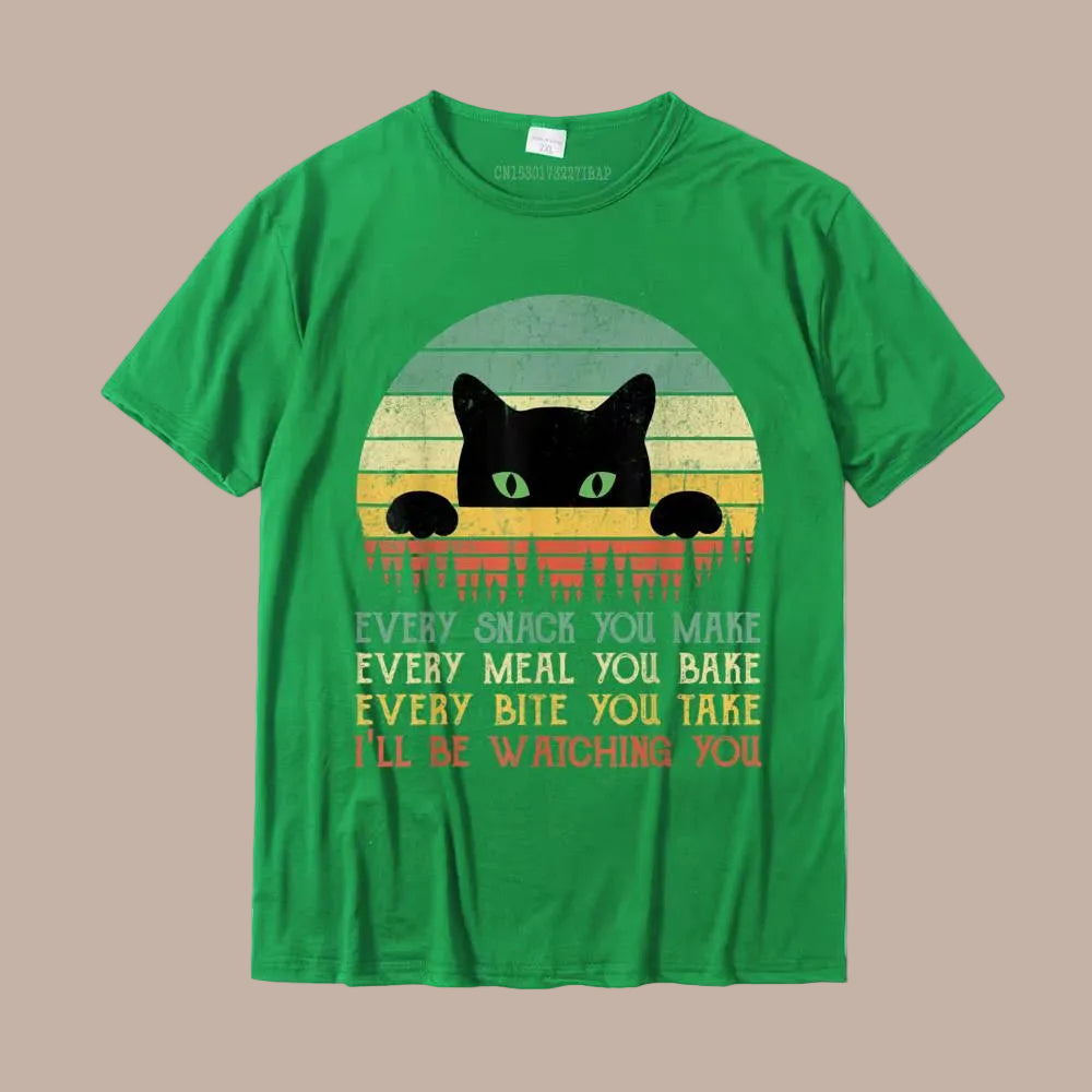 Green t-shirt with a black cat graphic and text on a white background