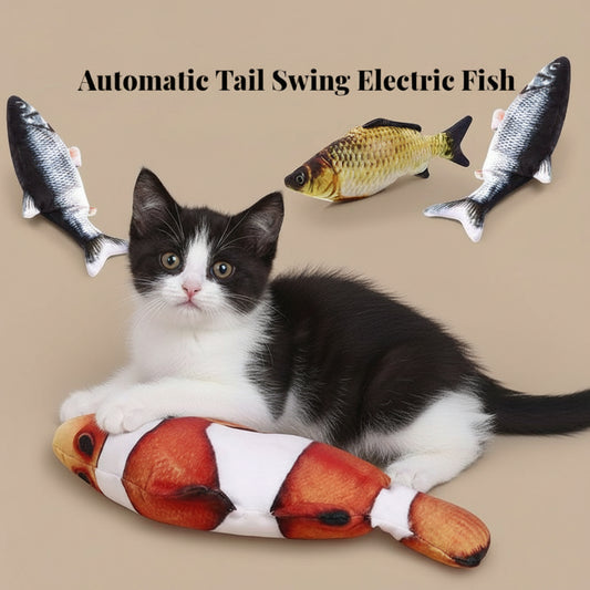Cat playing with an automatic tail swing electric fish toy on a light surface.
