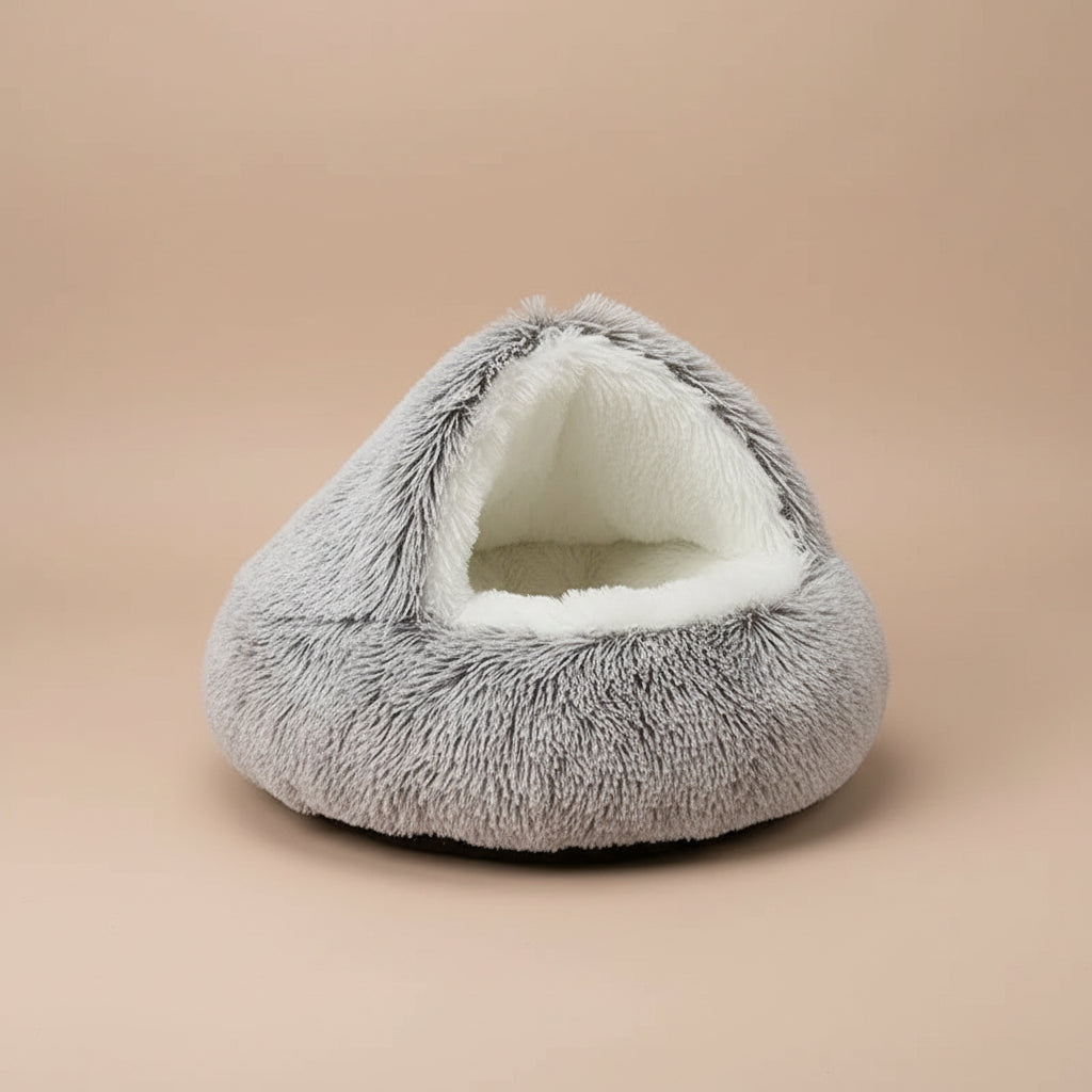 Brown pet bed with brown inside plush on a white background